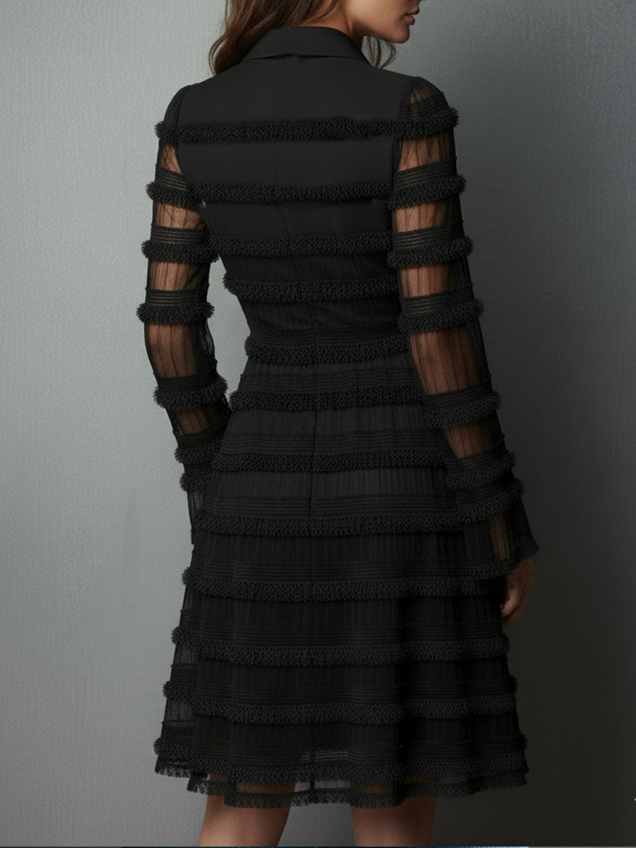 Mini-robe texturée noire transparente à volants et franges