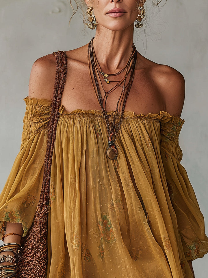 Robe courte en mousseline jaune à fleurs et épaules dénudées