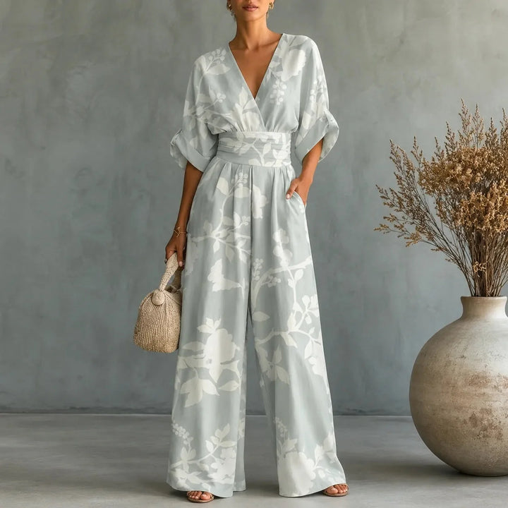 Solene – Printed V-Neck Wide-Leg Jumpsuit with Cinched Waist and Pockets