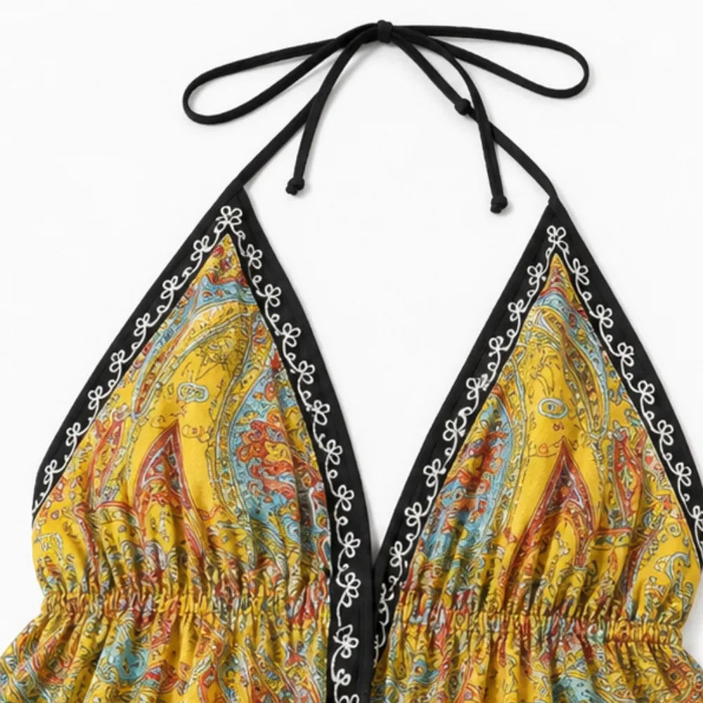 Solivia – Boho paisley halter maxi dress with open back and handkerchief hem