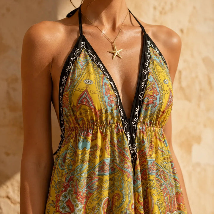 Solivia – Boho paisley halter maxi dress with open back and handkerchief hem